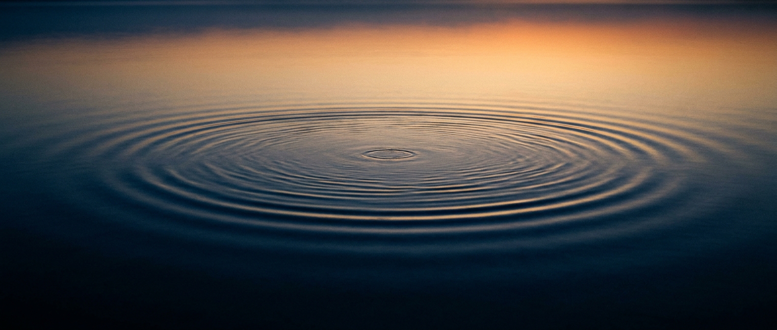 Sex Addiction Therapy — still clear water with gentle ripples catching soft dawn light